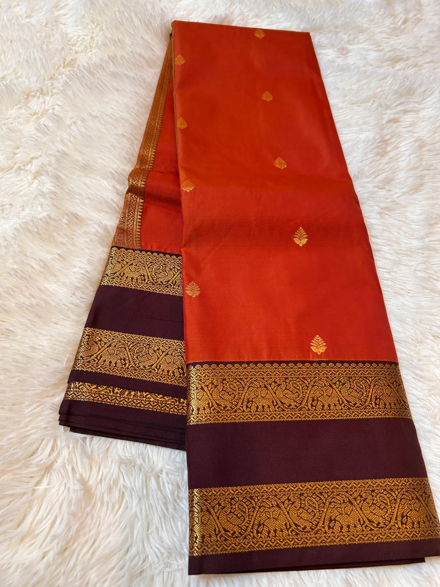 Beautiful Rust orange with coffee brown semi kanchipuram saree